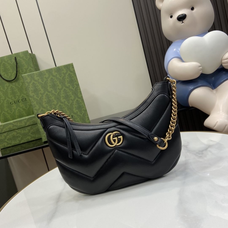 G*u*i top handle bags